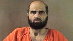 >Hasan chose not to address the 13 officers who could sentence him to death