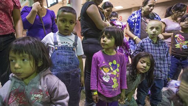 US cities grapple with influx of undocumented children