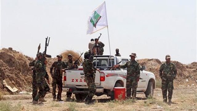 Iraqi forces claim to have broken ISIS siege of Shiite town