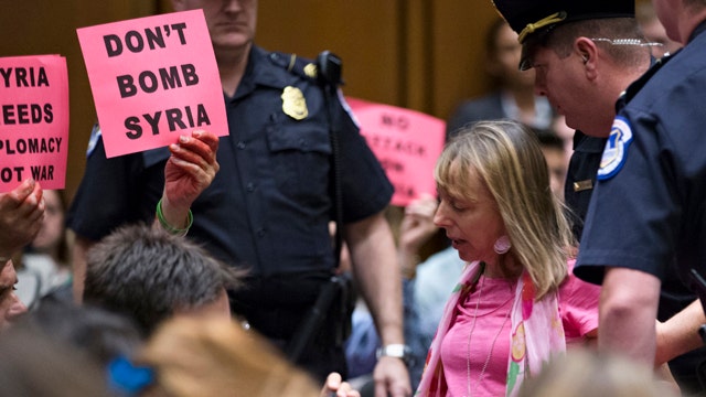 Kerry identifies with Code Pink protester