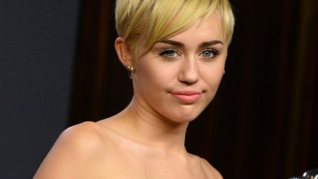 Miley Cyrus twerks again ... topless