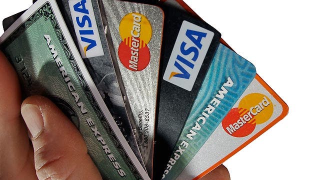 Consumers cutting back on credit card use in July