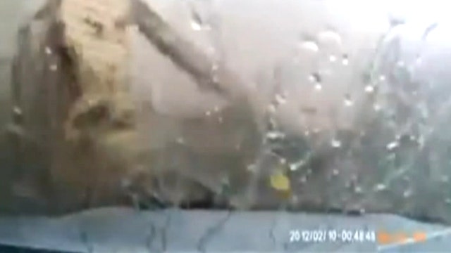 Twister terror: Destruction from tornado caught on dashcam