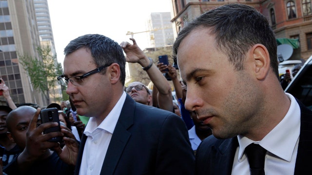 South African judge clears Pistorious of murder