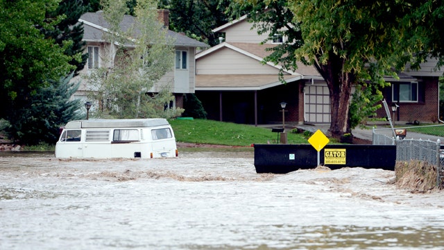 Historic, deadly Colorado floods force thousands to evacuate