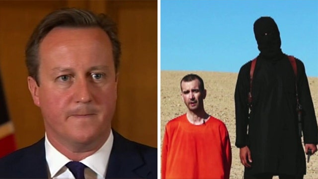 British PM David Cameron reacts to recent ISIS beheading