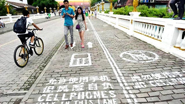 Grapevine: Chinese town has instated cellphone walking lanes