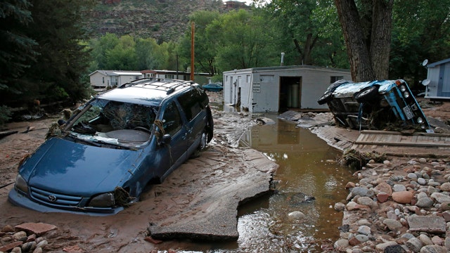 Massive clean-up begins as flood emergency ends in Colorado