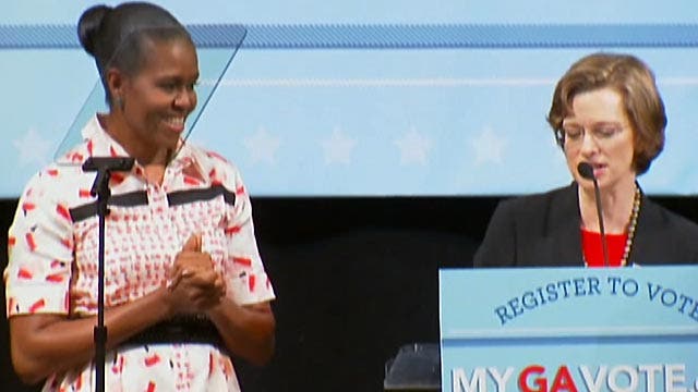 Michelle Obama hits campaign trail for endangered Dems