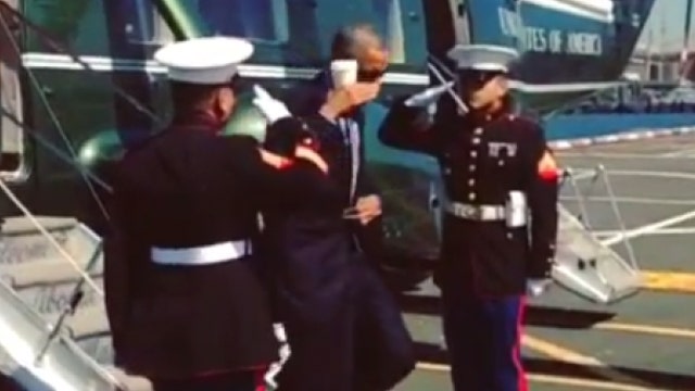 Obama takes heat for 'latte salute'