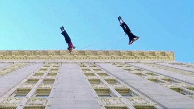 Dancers waltz on walls of Oakland's city hall