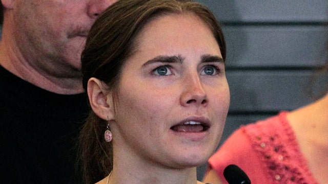 Amanda Knox remains in US as retrial gets under way in Italy