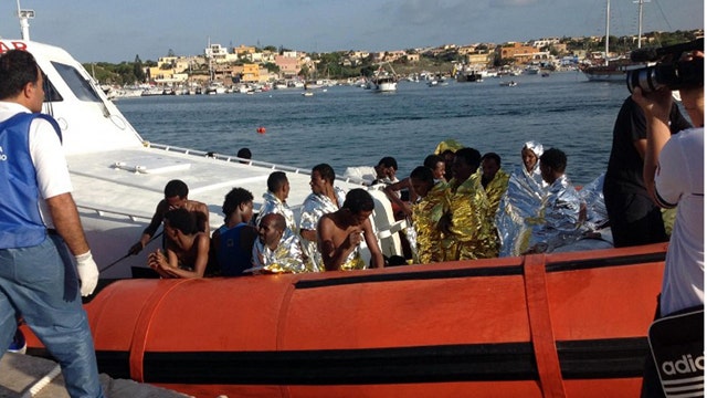 Dozens dead after migrant boat capsizes off Italian coast