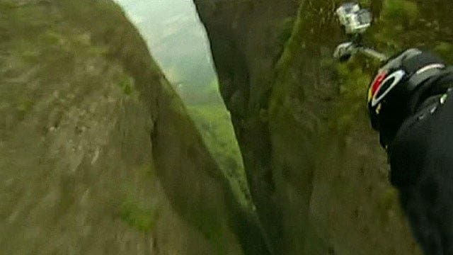 Man shoots headfirst between 30-foot rock opening at 122 mph