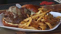 >Burger joint adds side of Communion wafer