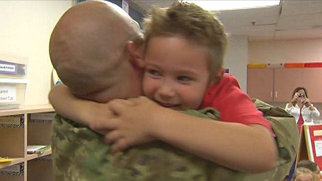 Soldier surprises children