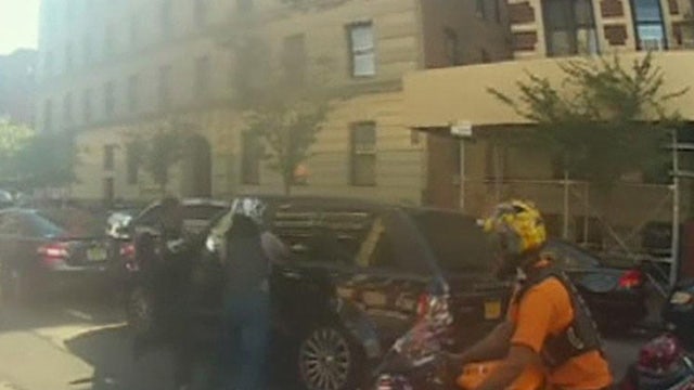 Did NYPD officers witness beating of SUV driver?