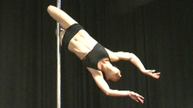 Pole dancers try to strip sport of 'stripper stigma'