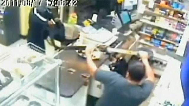 Deli worker chases armed robber out of store with machete