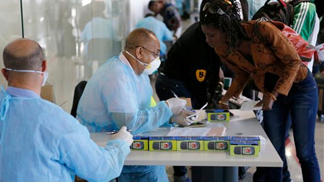 Calls for travel ban mount amid Ebola fears