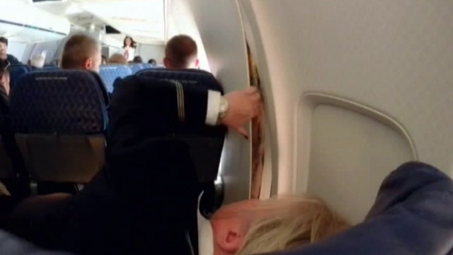 Scary moment captured on American Airlines flight