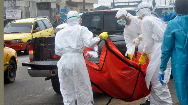 Time for a travel ban on Ebola hotbeds?