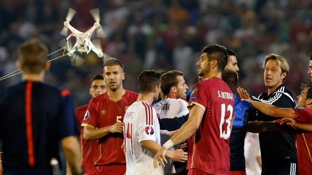 Drone carrying Albanian banner sparks fights on soccer field
