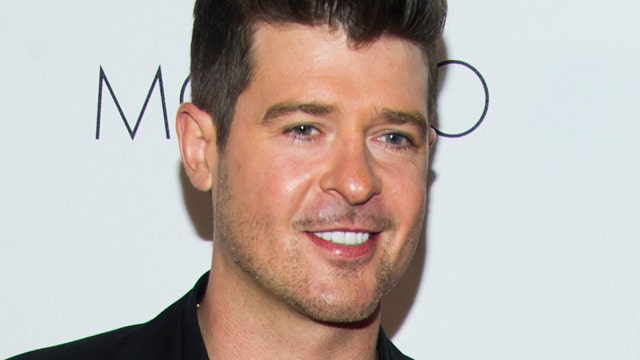 Thicke throws himself divorce party