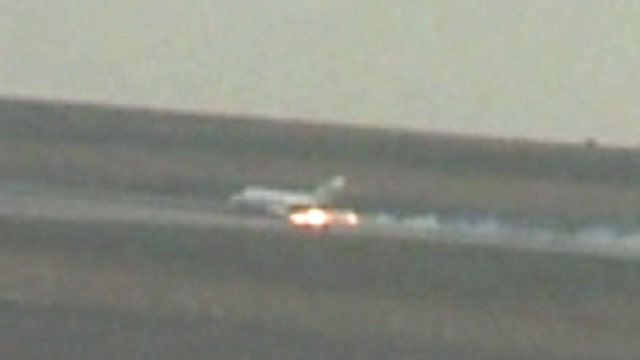 Sparks fly as private jet makes emergency landing in Denver