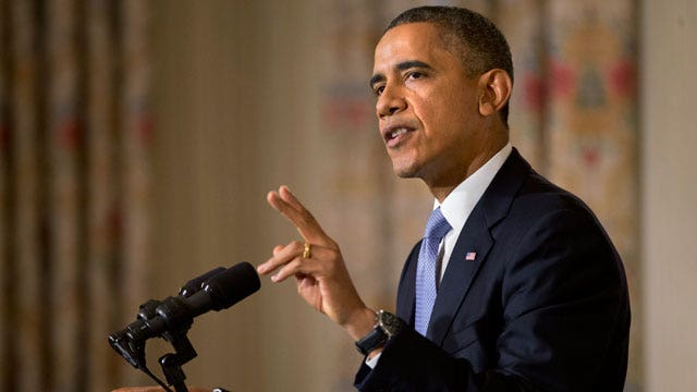 Obama jabs opponents while calling for common ground