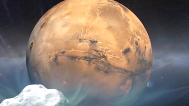 Comet flies within 87,000 miles of Mars