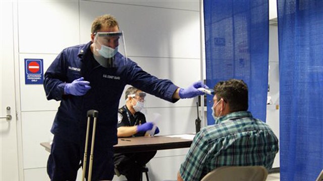 Ebola travel ban debate rages on