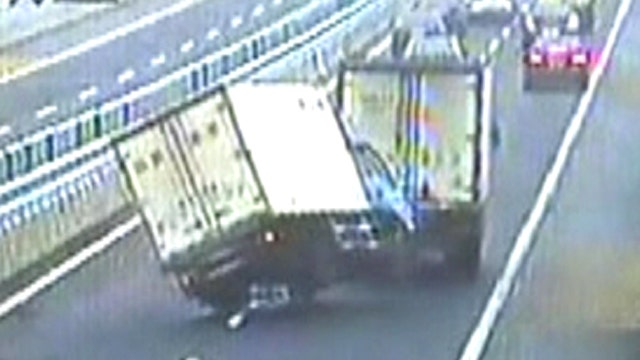 Truck zig-zags out of control, flips over