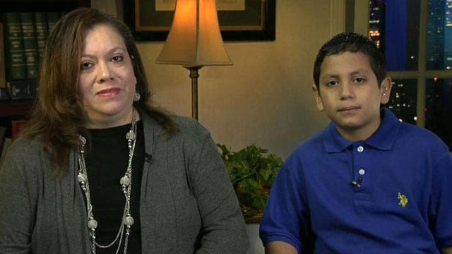 8-year-old boy battles purse snatcher