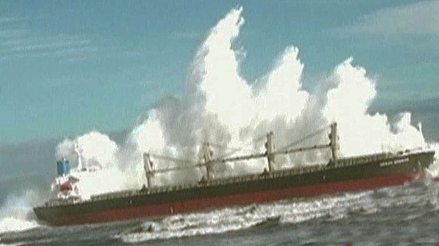 How does the U.S. Navy prepare for monster waves?