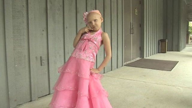 8-year-old battling cancer wins beauty pageant