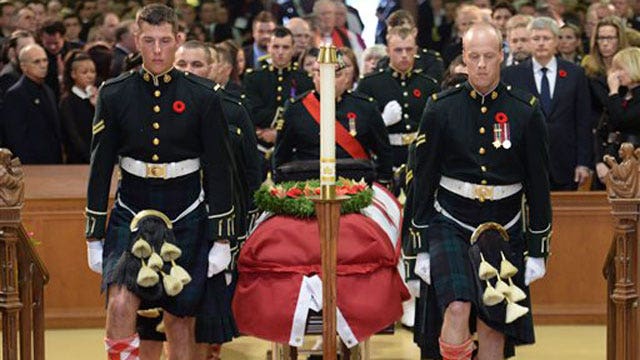 Thousands pay final respects to slain Canadian solider