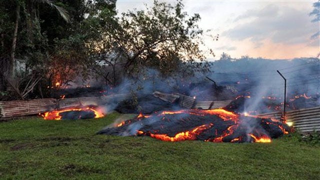 Hawaiian lava flows now threaten homes, businesses