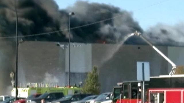 4 dead, 4 missing after plane crashes into building