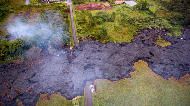 Lava threatens to swallow dozens of Hawaiian homes