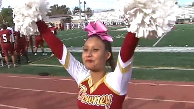 Deaf cheerleader defies odds to make competitive squad