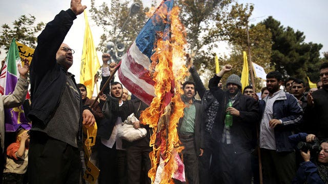 Thousands of Iranians protest at US embassy in Tehran