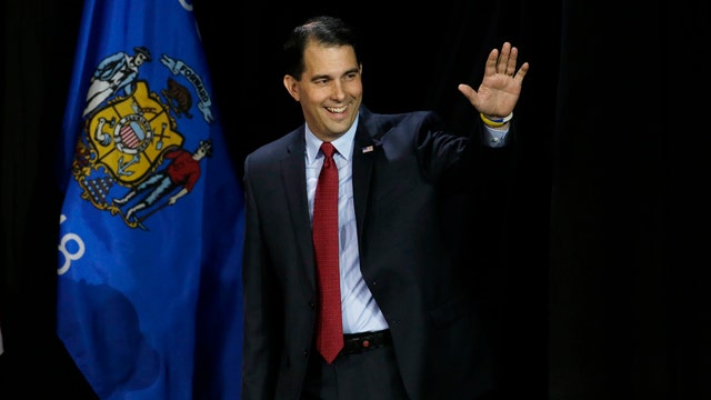 Walker: Success isn't defined by dependence on government