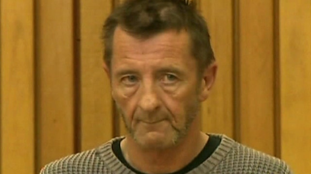 AC/DC Drummer charged in double murder plot
