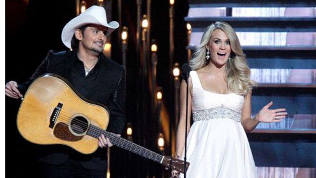Underwood, Paisley deliver music, jokes at CMA Awards