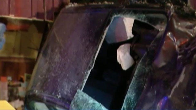 Car launches into the air, slams into house