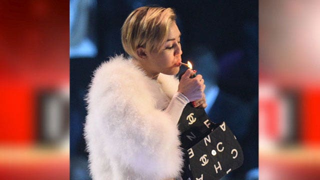 Miley smokes joint onstage