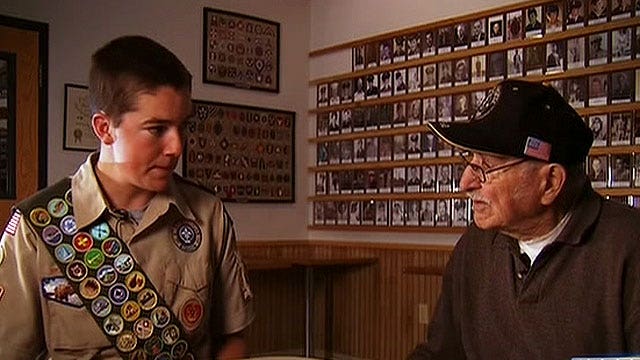 Boy Scout, Korean War vet team up to retire flags properly