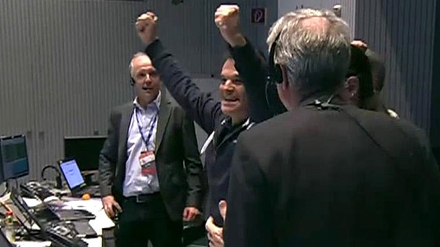 Unmanned spacecraft successfully lands on comet