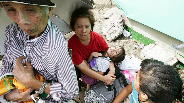 Aid groups face tough task to help Typhoon Haiyan victims   